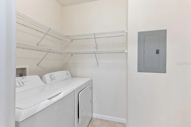 a view of a city from a big room with windows