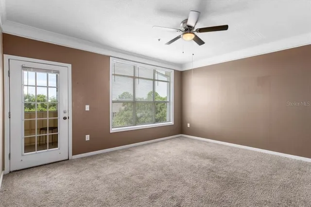 a view of a kitchen with a sink and a cabinet