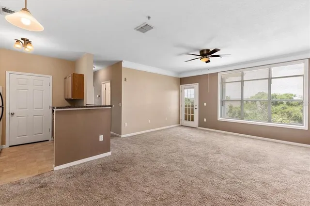 a kitchen with a stove and a refrigerator