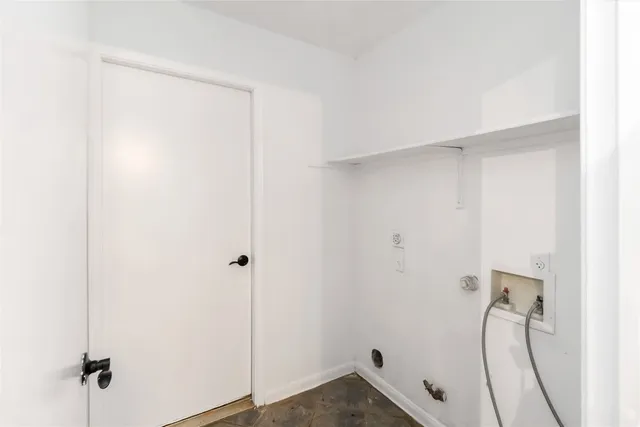 a view of a room with rack on the wall