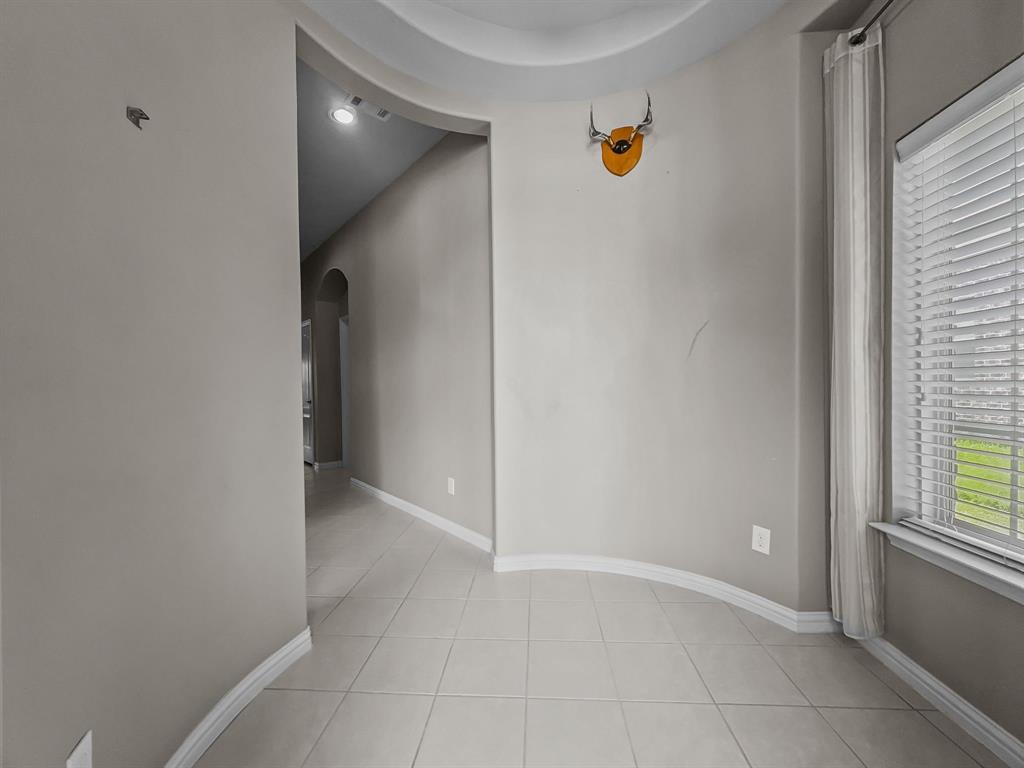 3205 Ridgeway Drive McKinney, TX 75071 - Photo 2 of 27 a view of an empty room