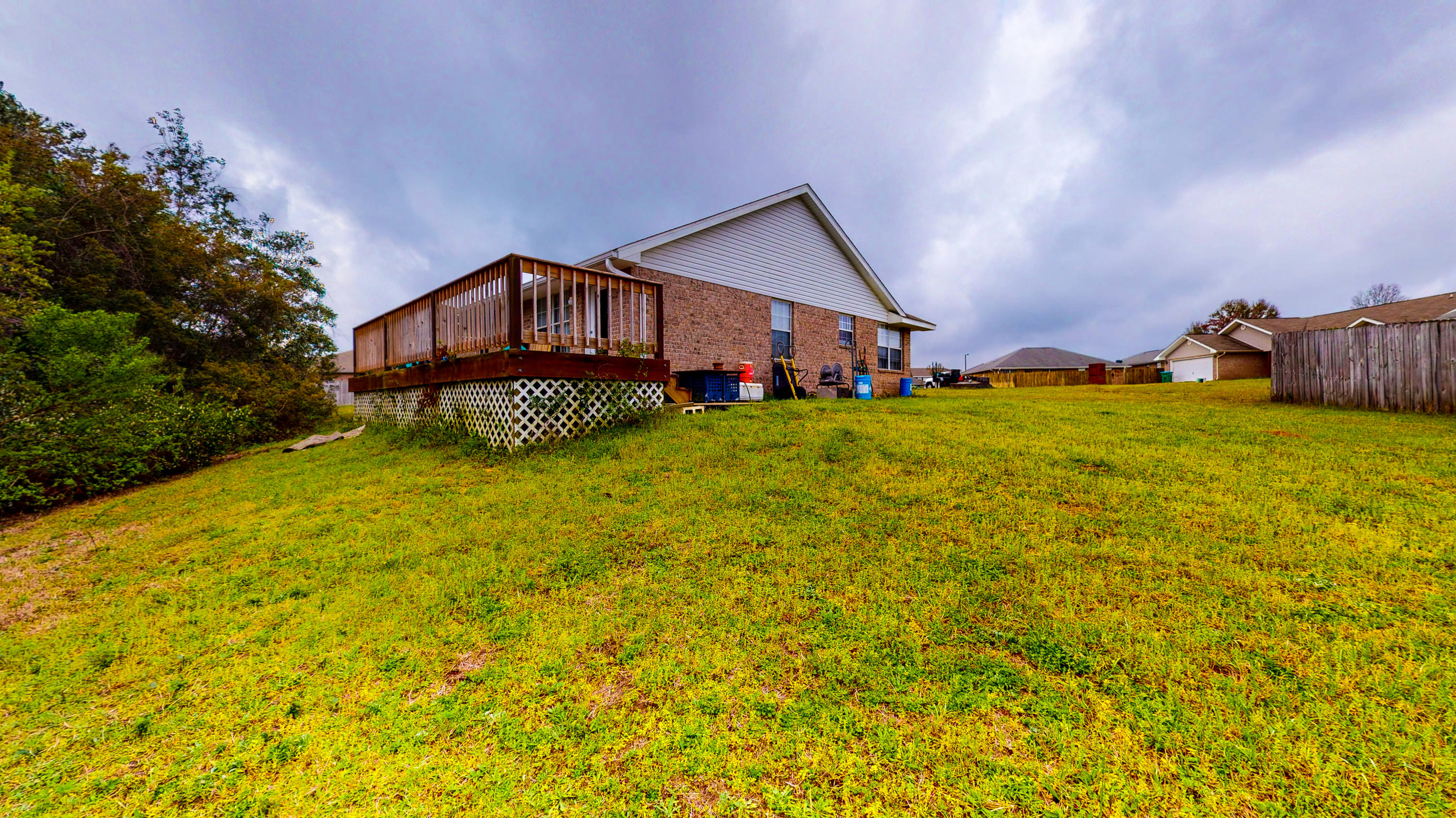 306 Shield Drive Crestview, FL 32539 - Photo 11 of 34 a house view with a outdoor space