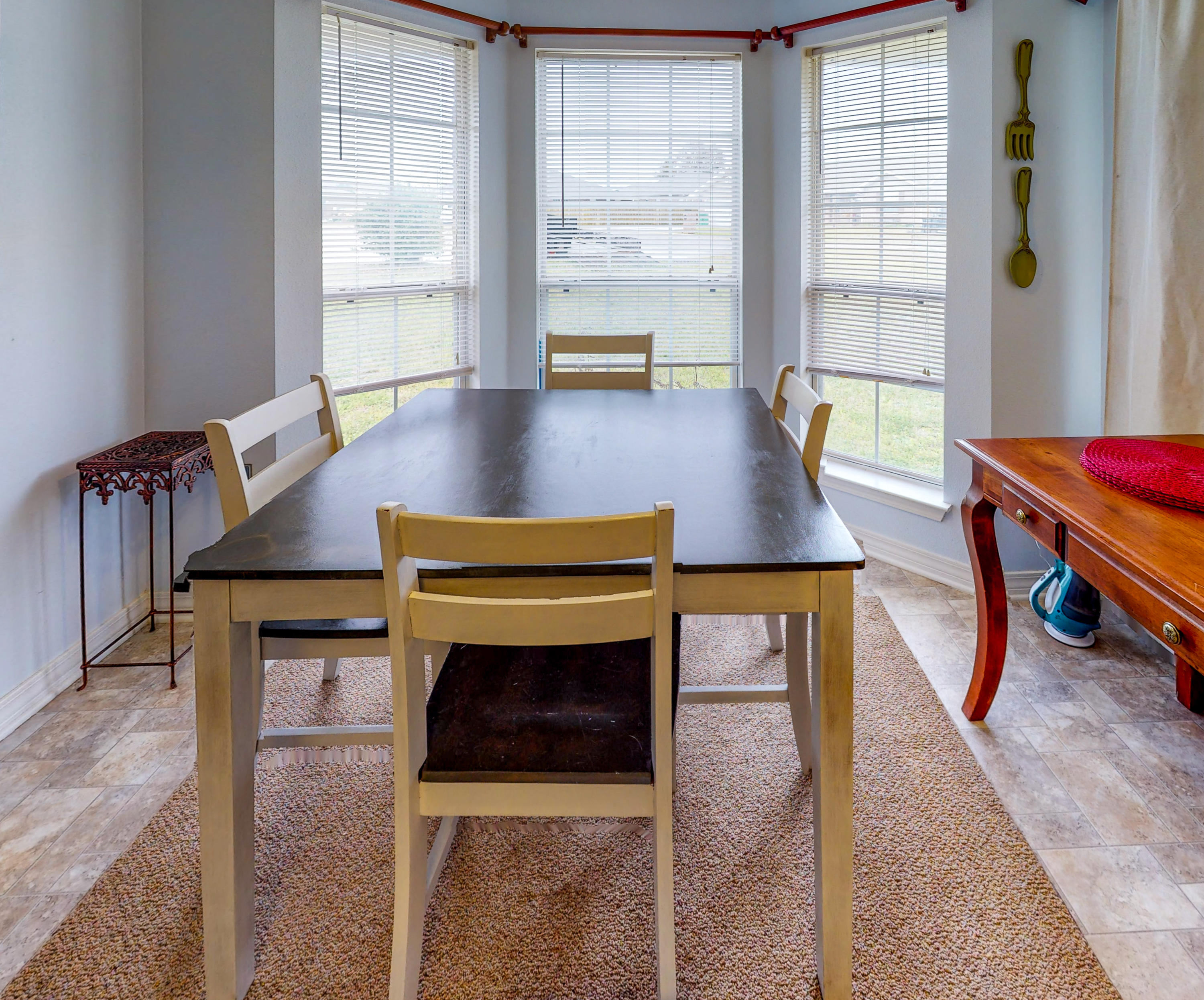 306 Shield Drive Crestview, FL 32539 - Photo 19 of 34 a living room with furniture a rug and a large window