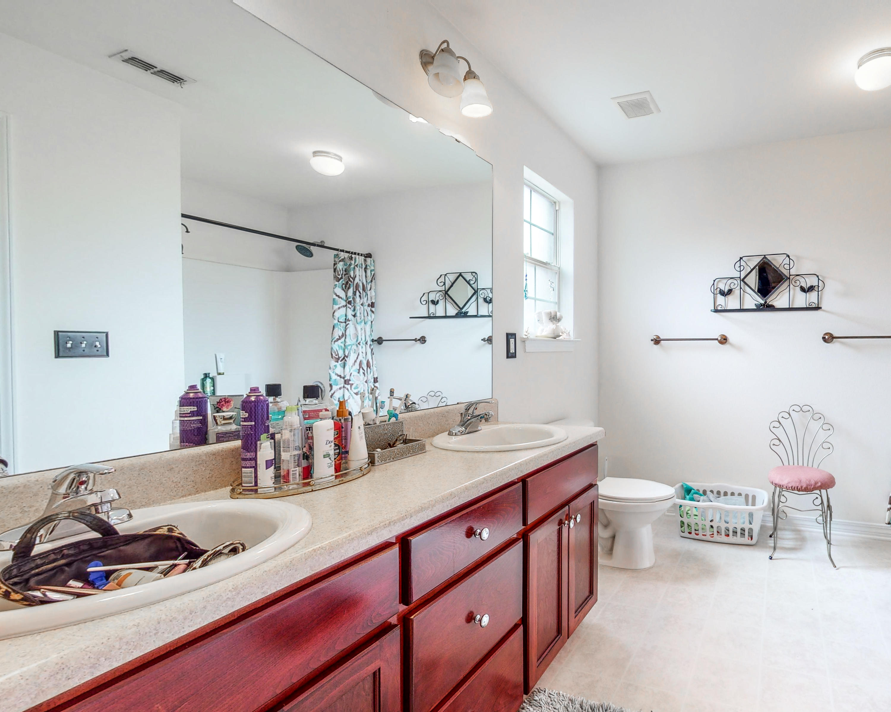 306 Shield Drive Crestview, FL 32539 - Photo 25 of 34 a kitchen with a sink stove and cabinets