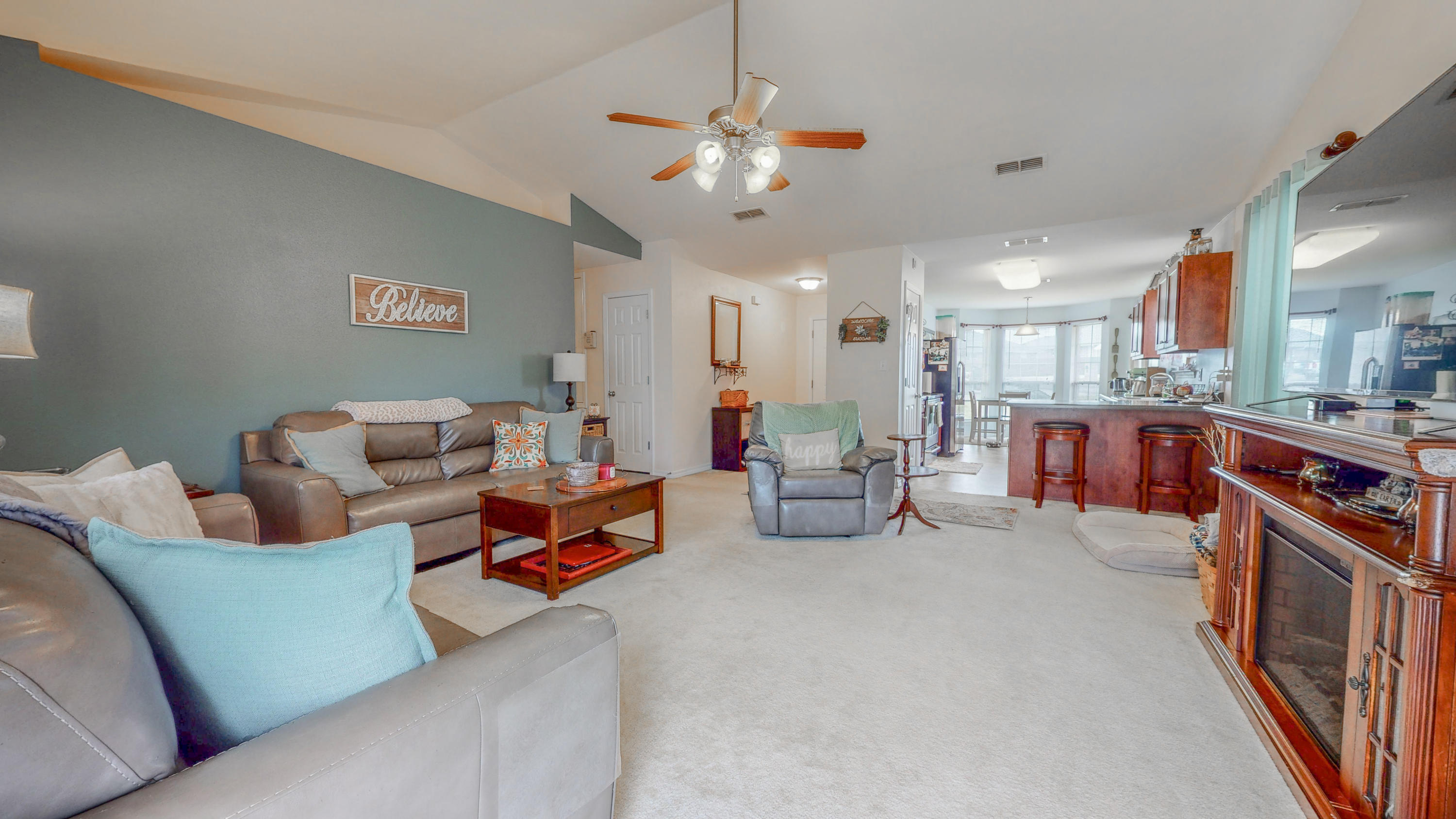306 Shield Drive Crestview, FL 32539 - Photo 3 of 34 a living room with furniture and kitchen view
