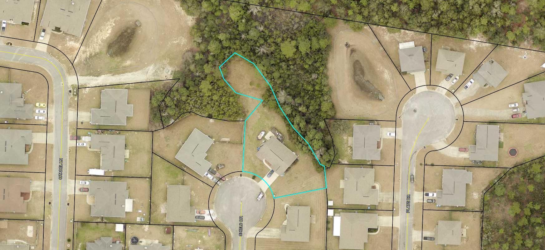 306 Shield Drive Crestview, FL 32539 - Photo 34 of 34 a picture of a bathroom with a sink and mirror