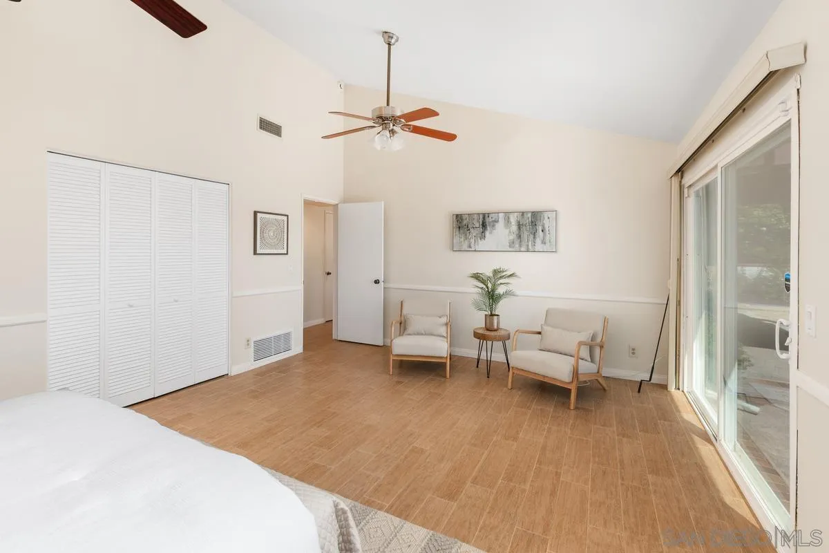 4219 Rueda Drive San Diego, CA 92124 - Photo 19 of 36 a living room with furniture and a wooden floor