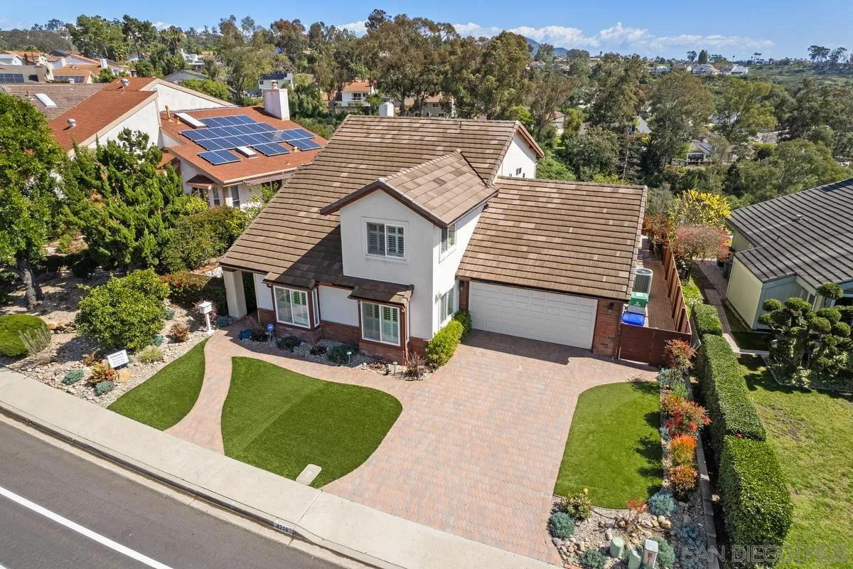 4219 Rueda Drive San Diego, CA 92124 - Photo 2 of 36 an aerial view of a house with a garden and plants