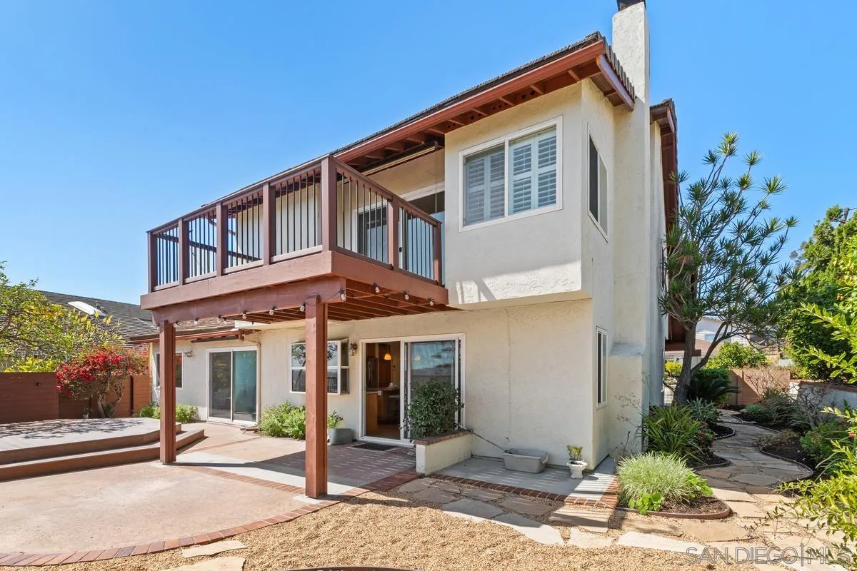 4219 Rueda Drive San Diego, CA 92124 - Photo 31 of 36 a front view of a house with garden
