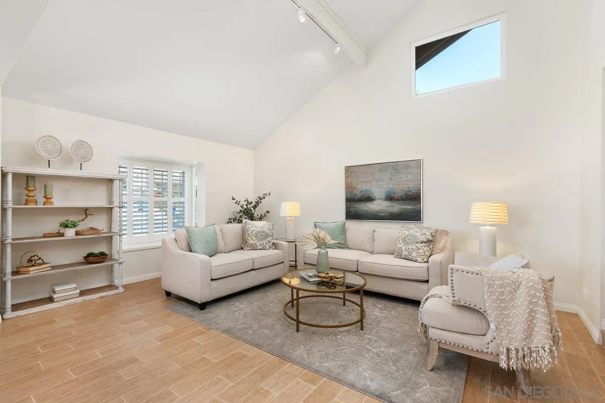 4219 Rueda Drive San Diego, CA 92124 - Photo 5 of 36 a living room with furniture and a flat screen tv