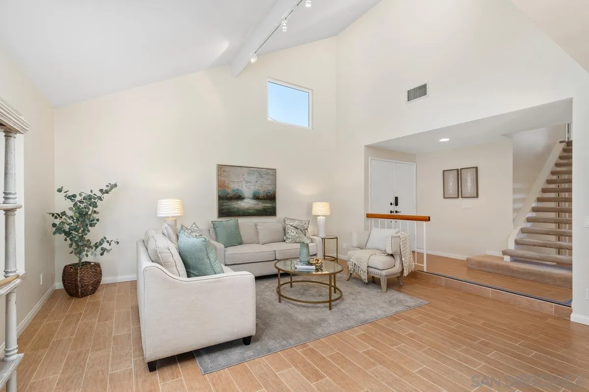 4219 Rueda Drive San Diego, CA 92124 - Photo 7 of 36 a living room with furniture and a potted plant