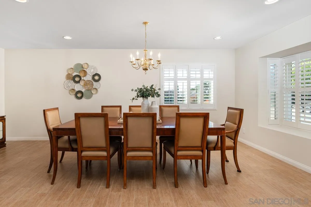 4219 Rueda Drive San Diego, CA 92124 - Photo 9 of 36 a view of a dining room with furniture window and outside view