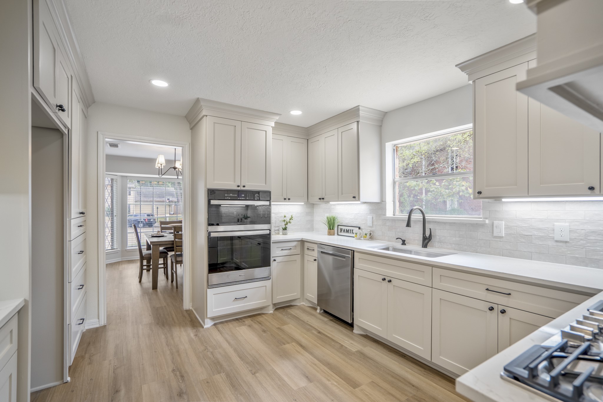 8006 Vickridge Lane Spring, TX 77379 - Photo 11 of 50 a kitchen with a sink cabinets and window
