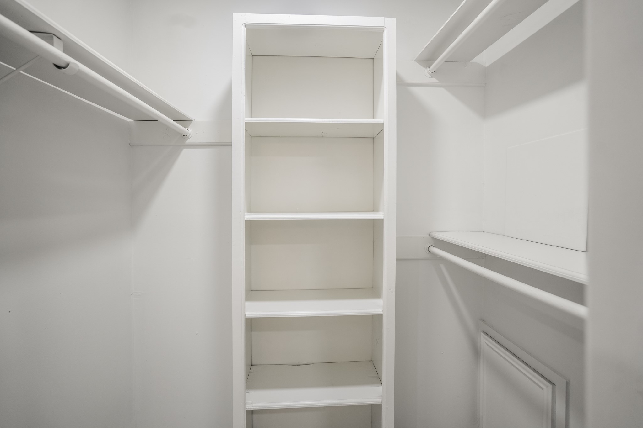 8006 Vickridge Lane Spring, TX 77379 - Photo 24 of 50 a view of walk in closet with empty racks