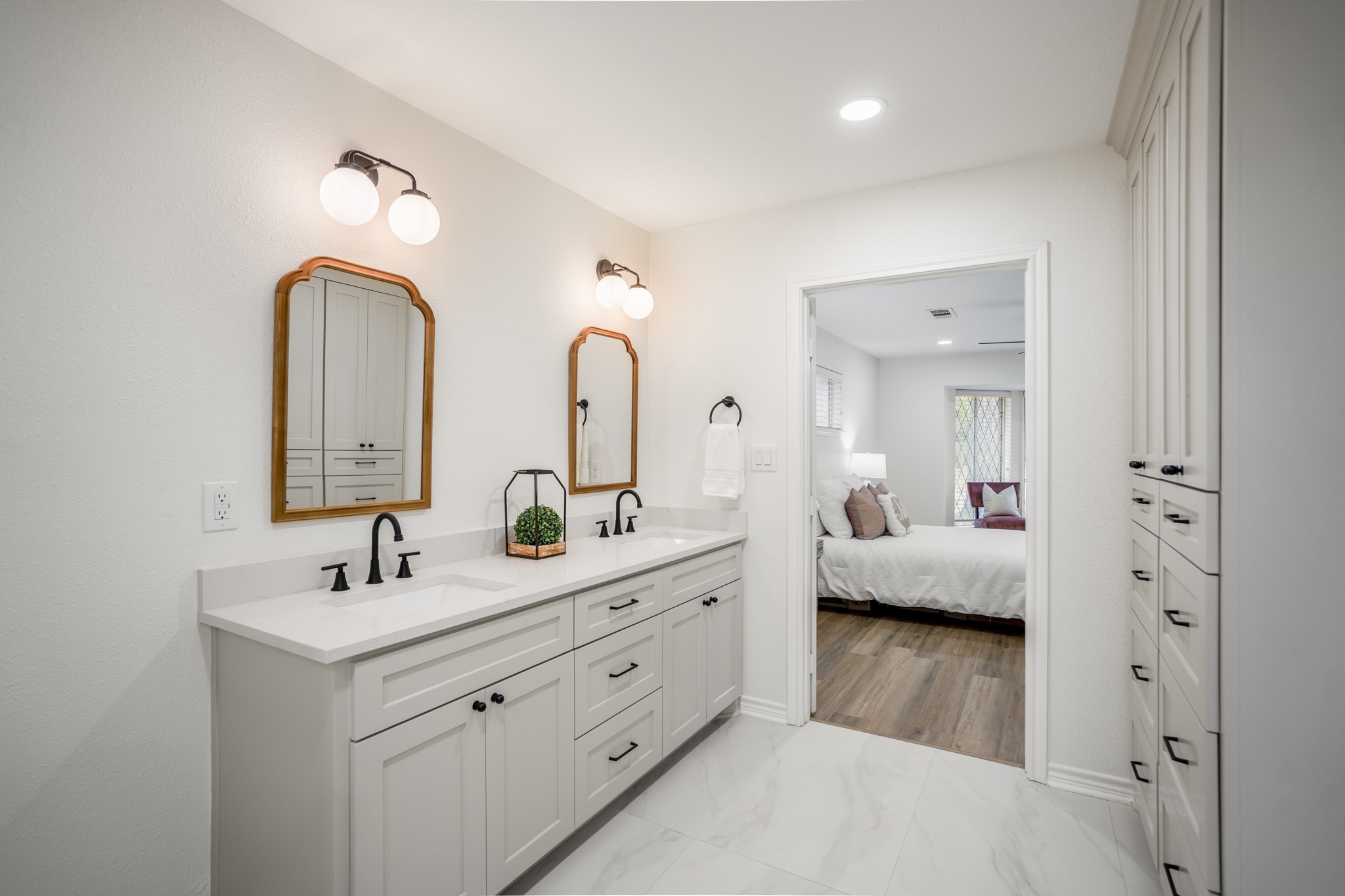 8006 Vickridge Lane Spring, TX 77379 - Photo 25 of 50 a en suite bathroom with double sink and a mirror