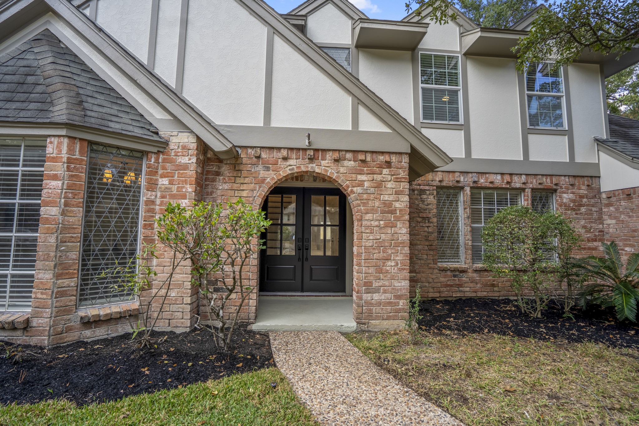 8006 Vickridge Lane Spring, TX 77379 - Photo 3 of 50 a front view of a house with garden