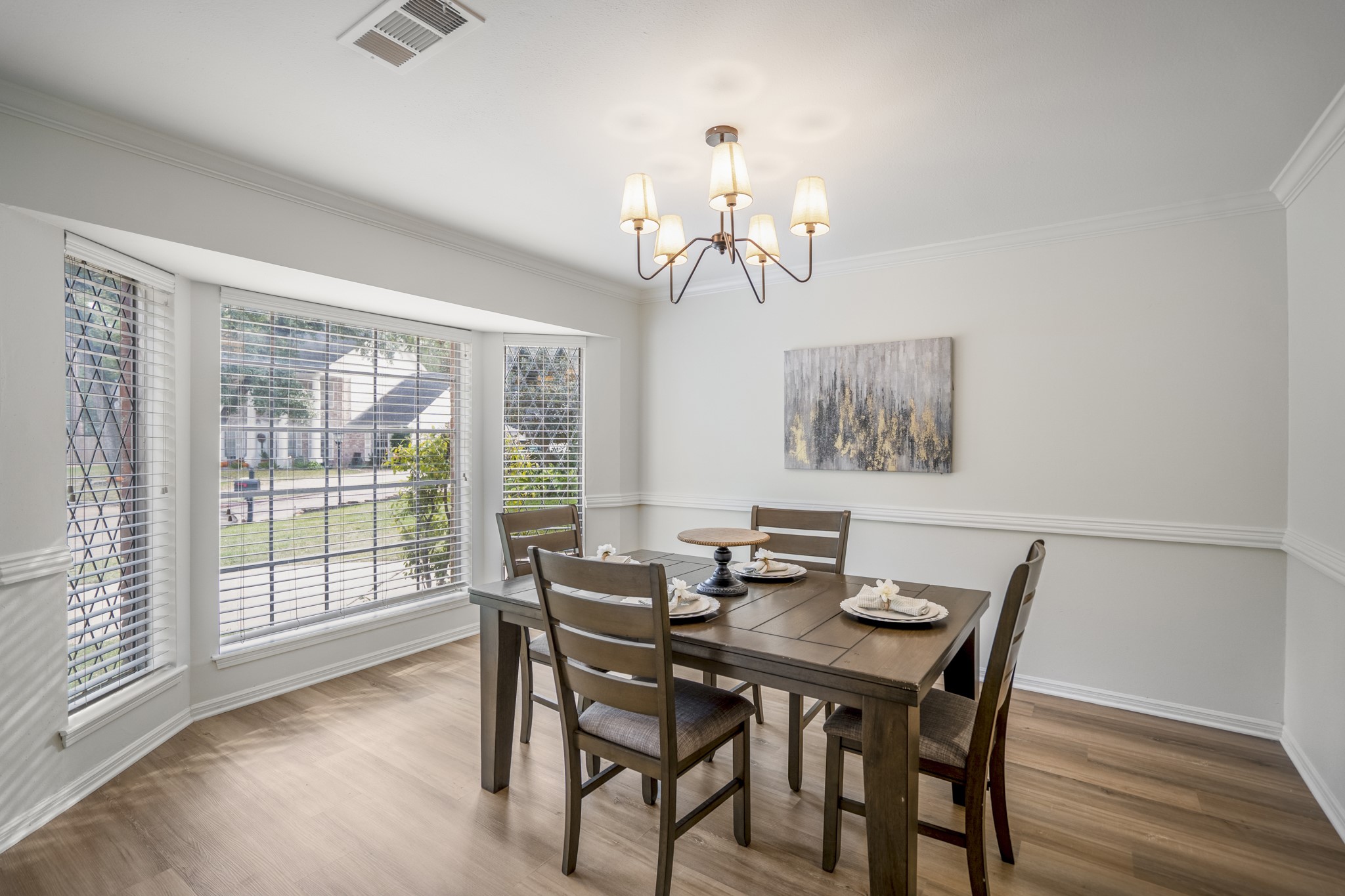 8006 Vickridge Lane Spring, TX 77379 - Photo 8 of 50 a view of a dining room with furniture wooden floor and chandelier