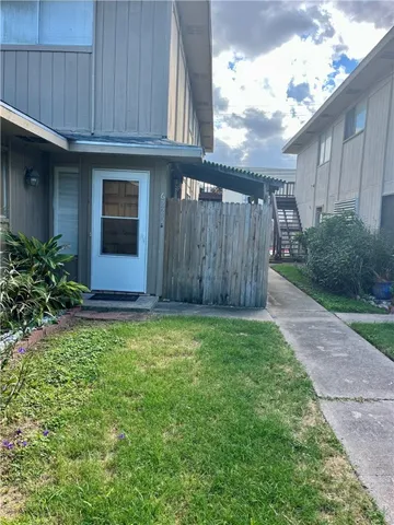 a view of a house with a garden