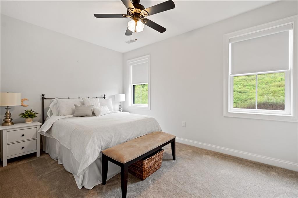 406 Silver Crest Drive Venetia, PA 15367 - Photo 12 of 25 a bedroom with a bed and window