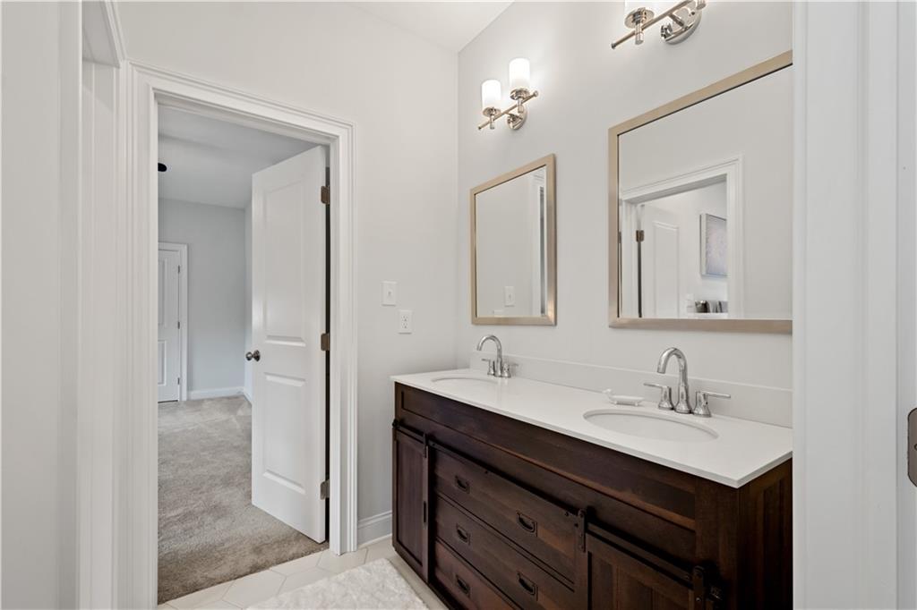 406 Silver Crest Drive Venetia, PA 15367 - Photo 13 of 25 a bathroom with a sink double vanity and a mirror