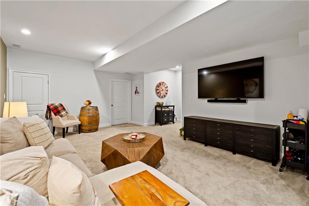406 Silver Crest Drive Venetia, PA 15367 - Photo 18 of 25 a living room with furniture and a flat screen tv