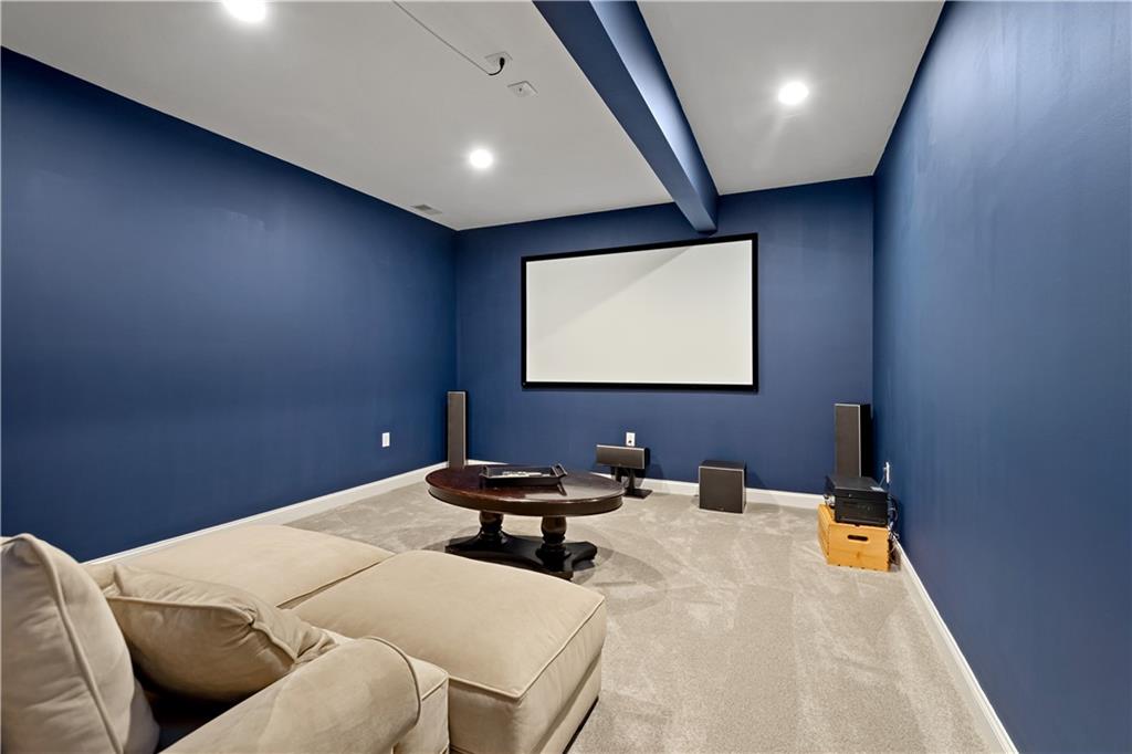 406 Silver Crest Drive Venetia, PA 15367 - Photo 19 of 25 a room with table chairs and a flat screen tv