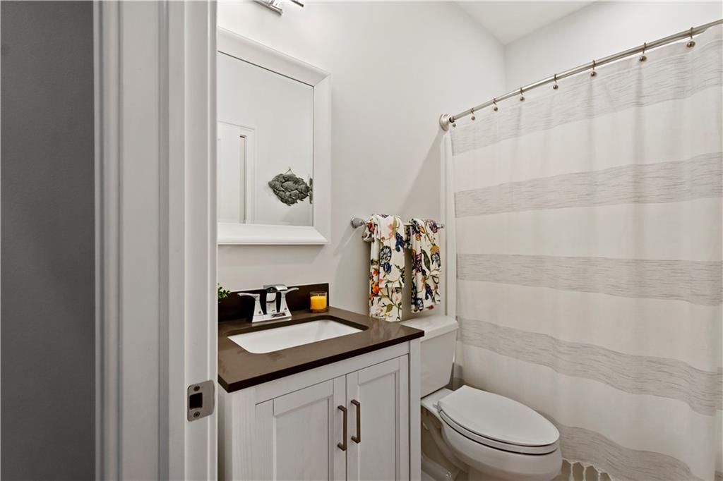406 Silver Crest Drive Venetia, PA 15367 - Photo 20 of 25 a bathroom with a granite countertop sink toilet and shower