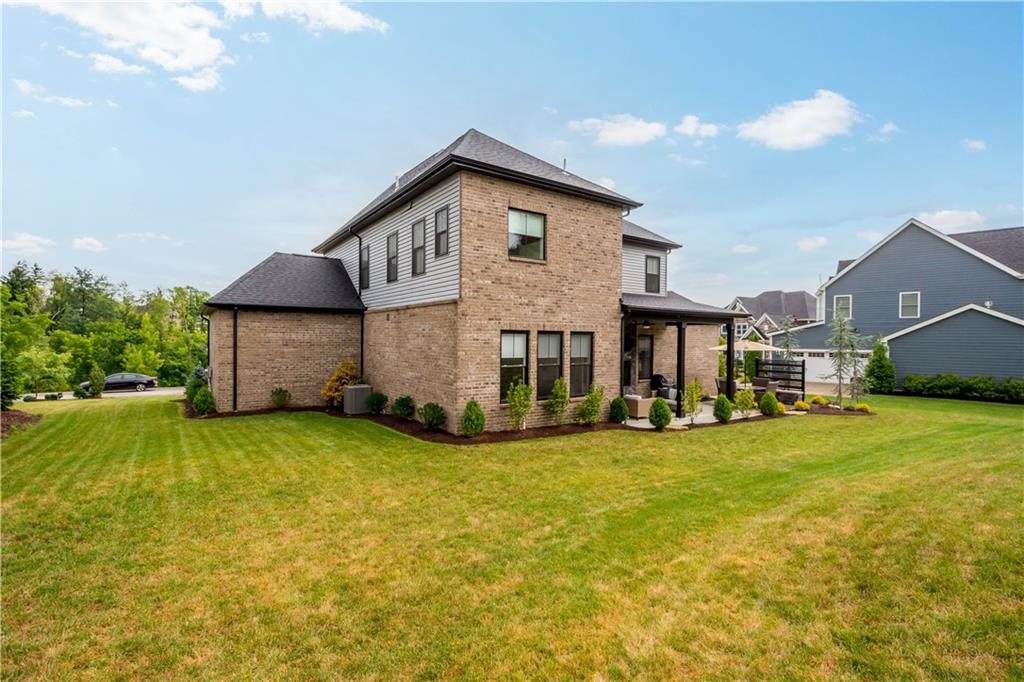 406 Silver Crest Drive Venetia, PA 15367 - Photo 23 of 25 a view of a house with a yard and sitting area