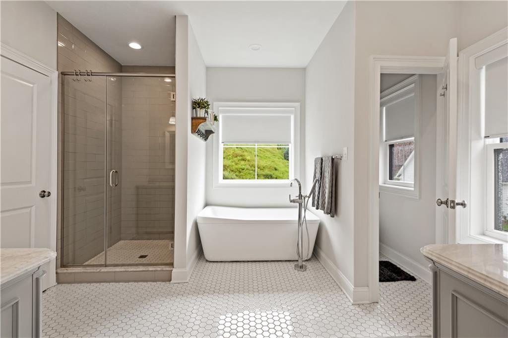 406 Silver Crest Drive Venetia, PA 15367 - Photo 10 of 25 a bathroom with a bathtub and a shower