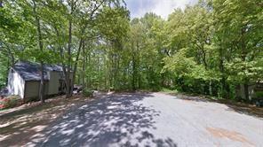0 Hembree Lane Southwest Austell, GA 30168 - Photo 12 of 13 a view of a backyard with large trees