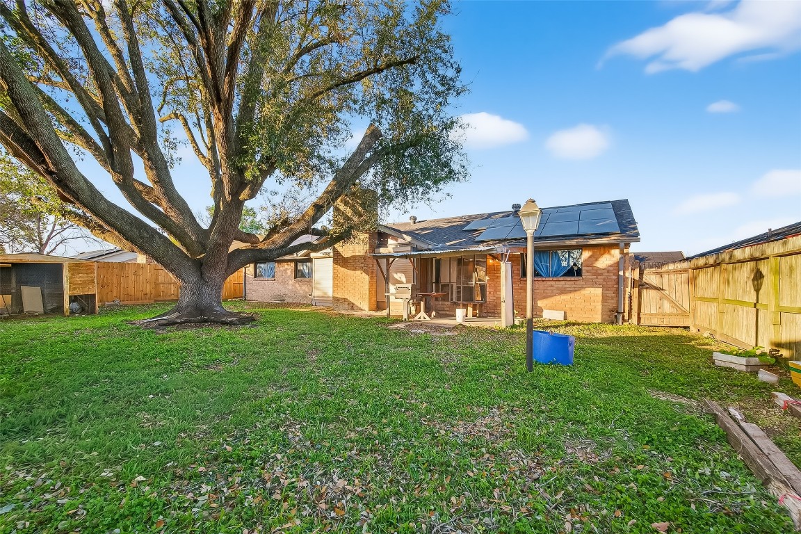 10706 Sagebluff Drive Houston, TX 77089 - Photo 19 of 19 a view of a house with a backyard
