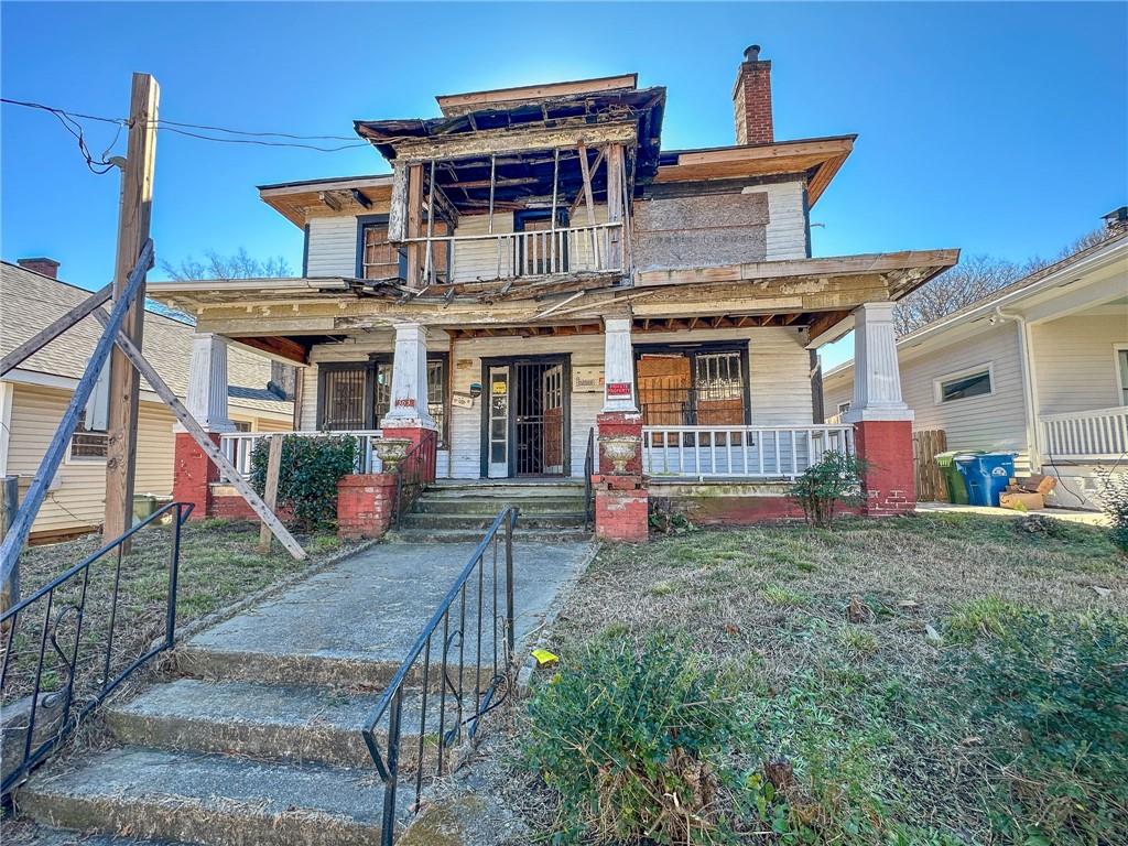 363 Irwin Street Northeast Atlanta, GA 30312 - Photo 1 of 5 a front view of a house with a yard