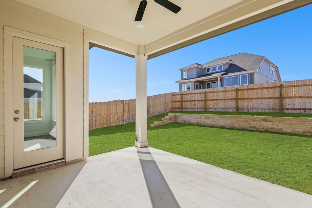 19512 Judys View Pflugerville, TX 78660 - Photo 32 of 38 a view of a house with a yard