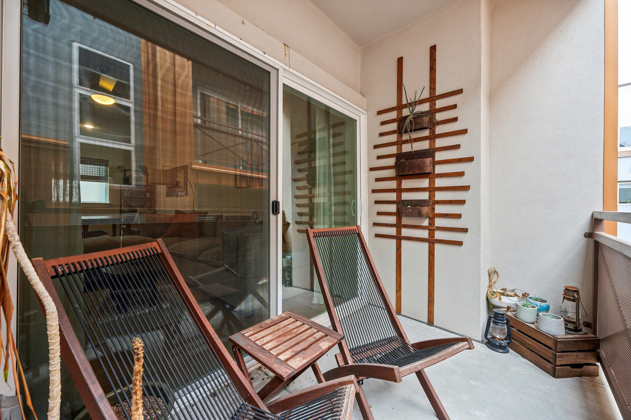 2827 Manor Road, Unit 3104 Austin, TX 78722 - Photo 9 of 30 A tranquil balcony retreat, perfect for relaxation and enjoying the outdoor air.