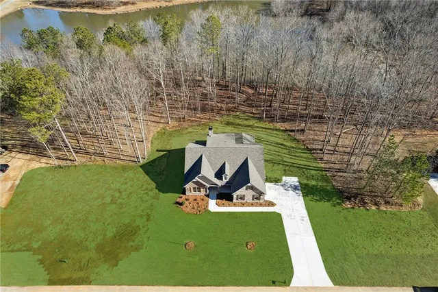 a view of a table and chairs in the garden