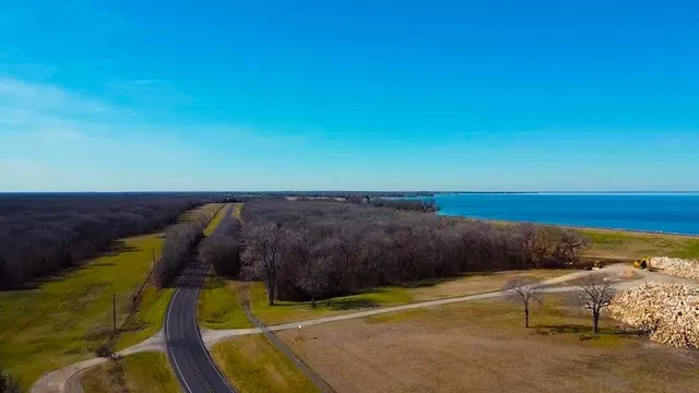 a view of a swimming pool and an outdoor seating