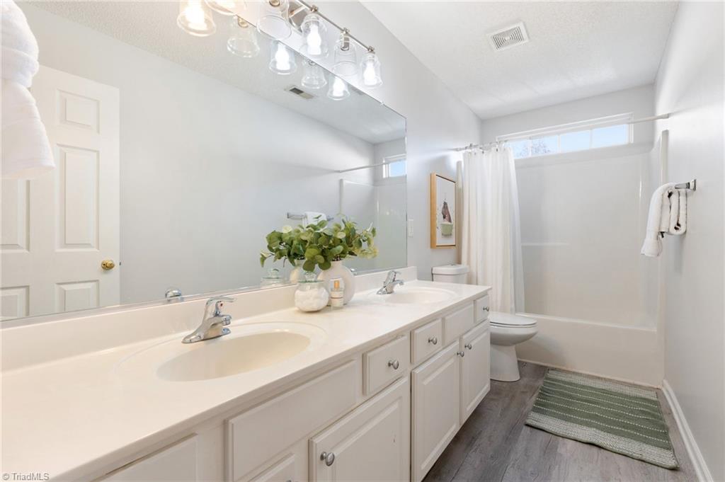 4505 Garden Club Street High Point, NC 27265 - Photo 35 of 44 Hallway Bathroom (Upstairs)