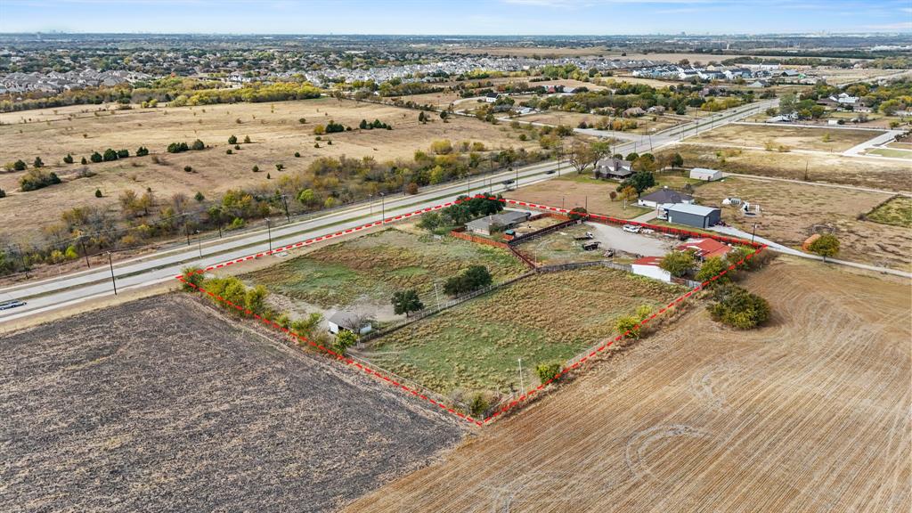 8614 Merritt Road Rowlett, TX 75089 - Photo 5 of 8 an aerial view of residential houses with outdoor space