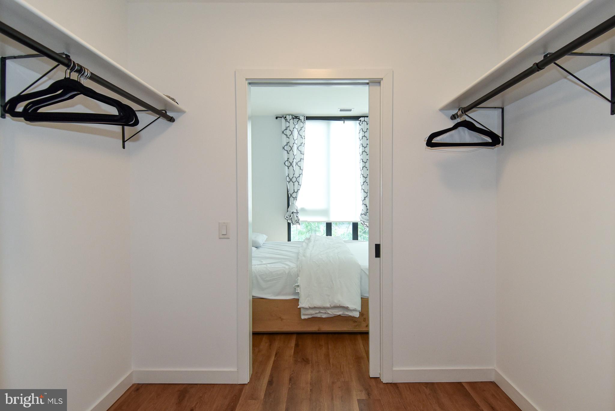 57 N Street Northwest, Unit 225 Washington, DC 20001 - Photo 21 of 38 a view of front door with wooden floor