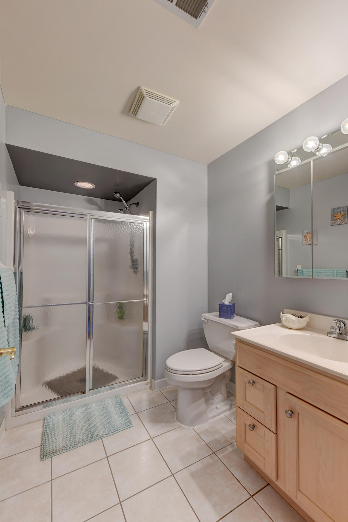 2740 Georgetowne Drive, Unit B1 Highland, IN 46322 - Photo 11 of 22 a bathroom with a sink toilet and shower