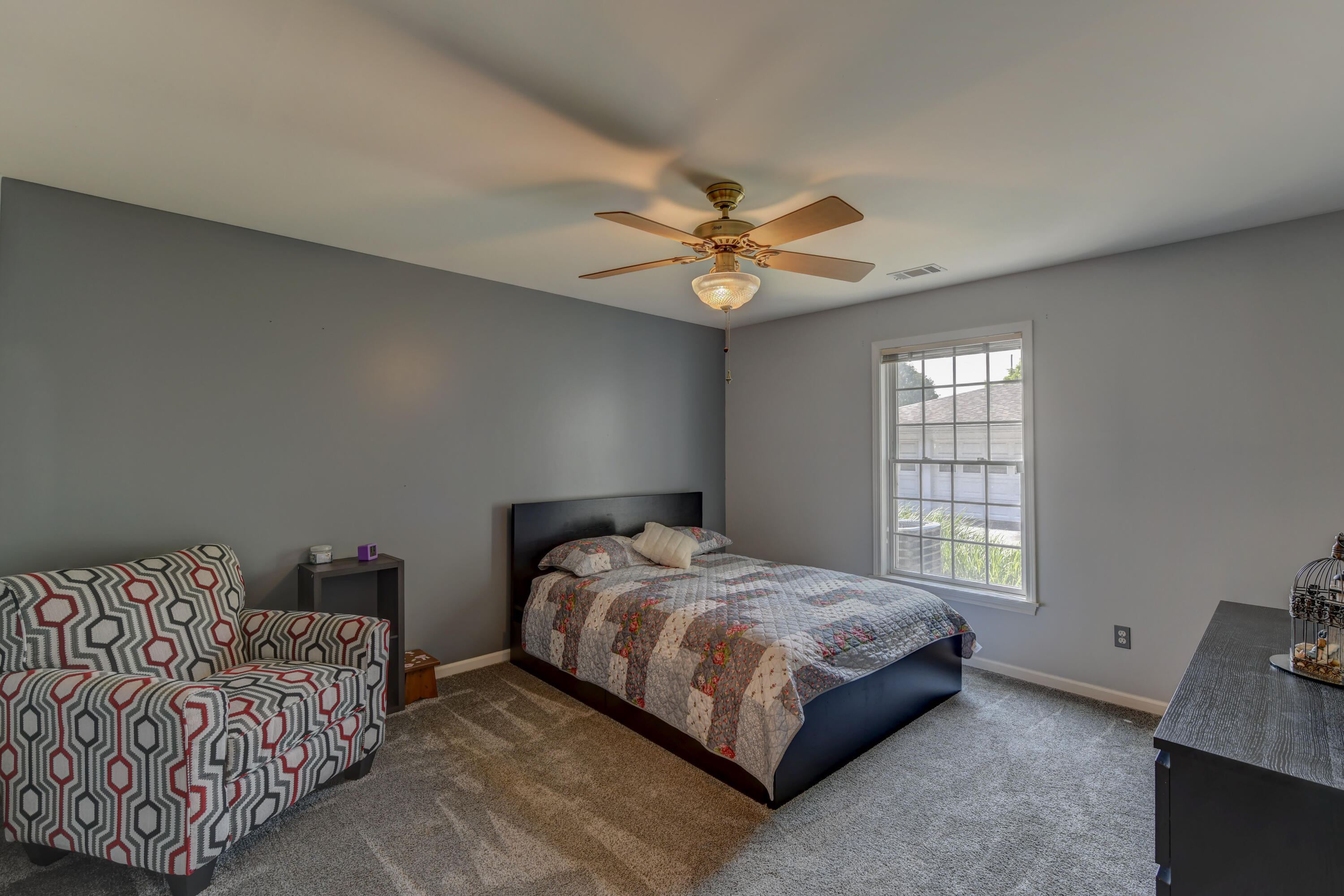 2740 Georgetowne Drive, Unit B1 Highland, IN 46322 - Photo 13 of 22 a bedroom with a bed and a couch