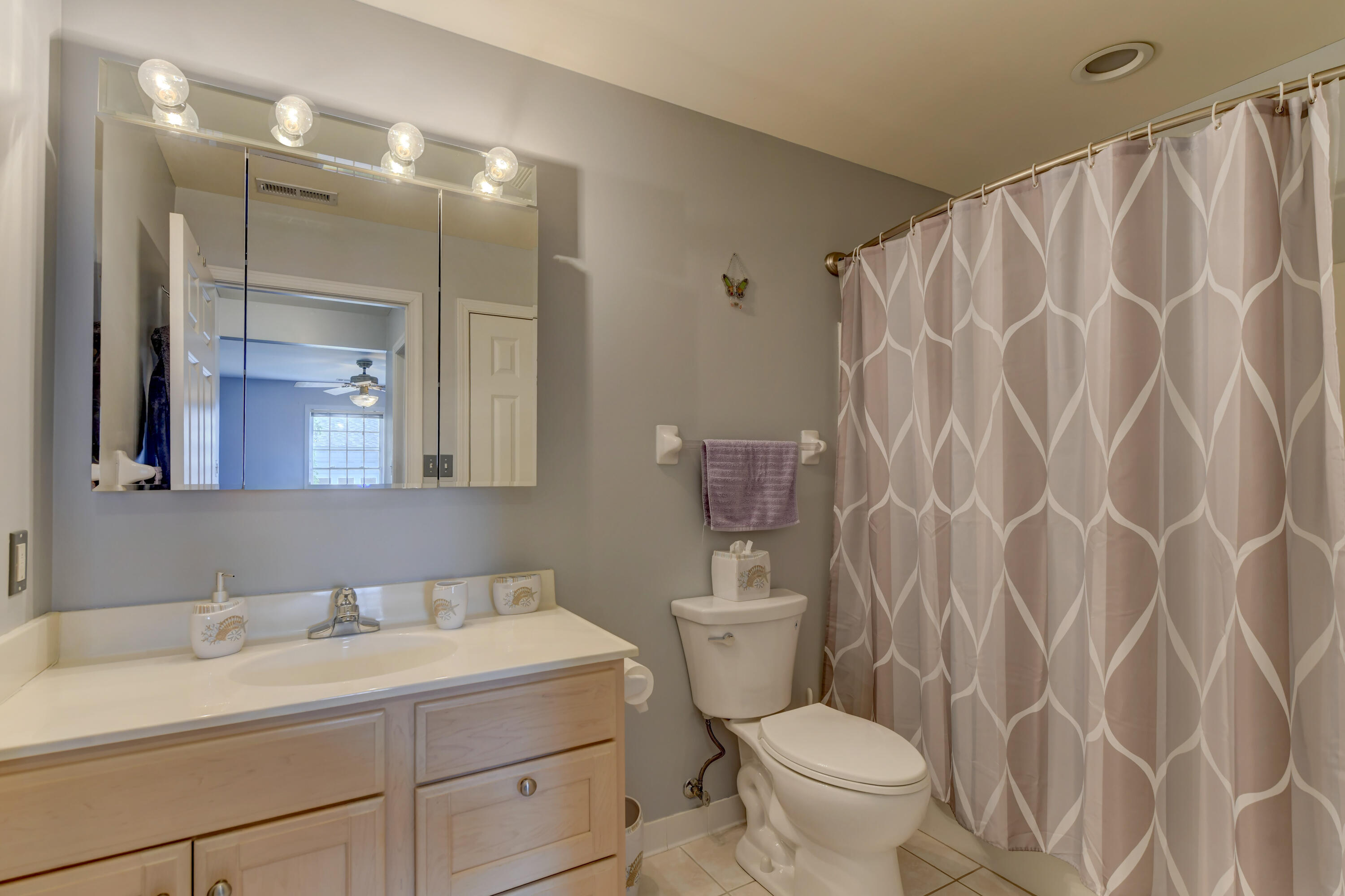 2740 Georgetowne Drive, Unit B1 Highland, IN 46322 - Photo 14 of 22 a bathroom with a sink and a toilet