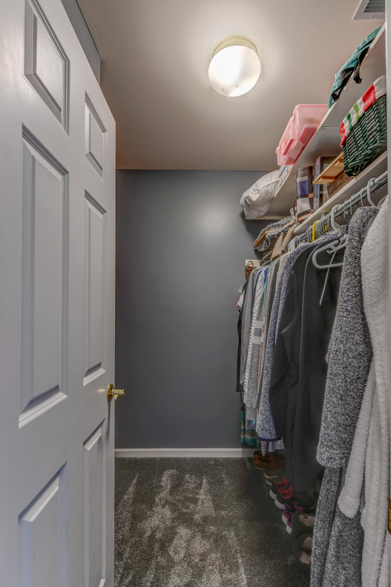 2740 Georgetowne Drive, Unit B1 Highland, IN 46322 - Photo 15 of 22 a view of walk in closet with clothes
