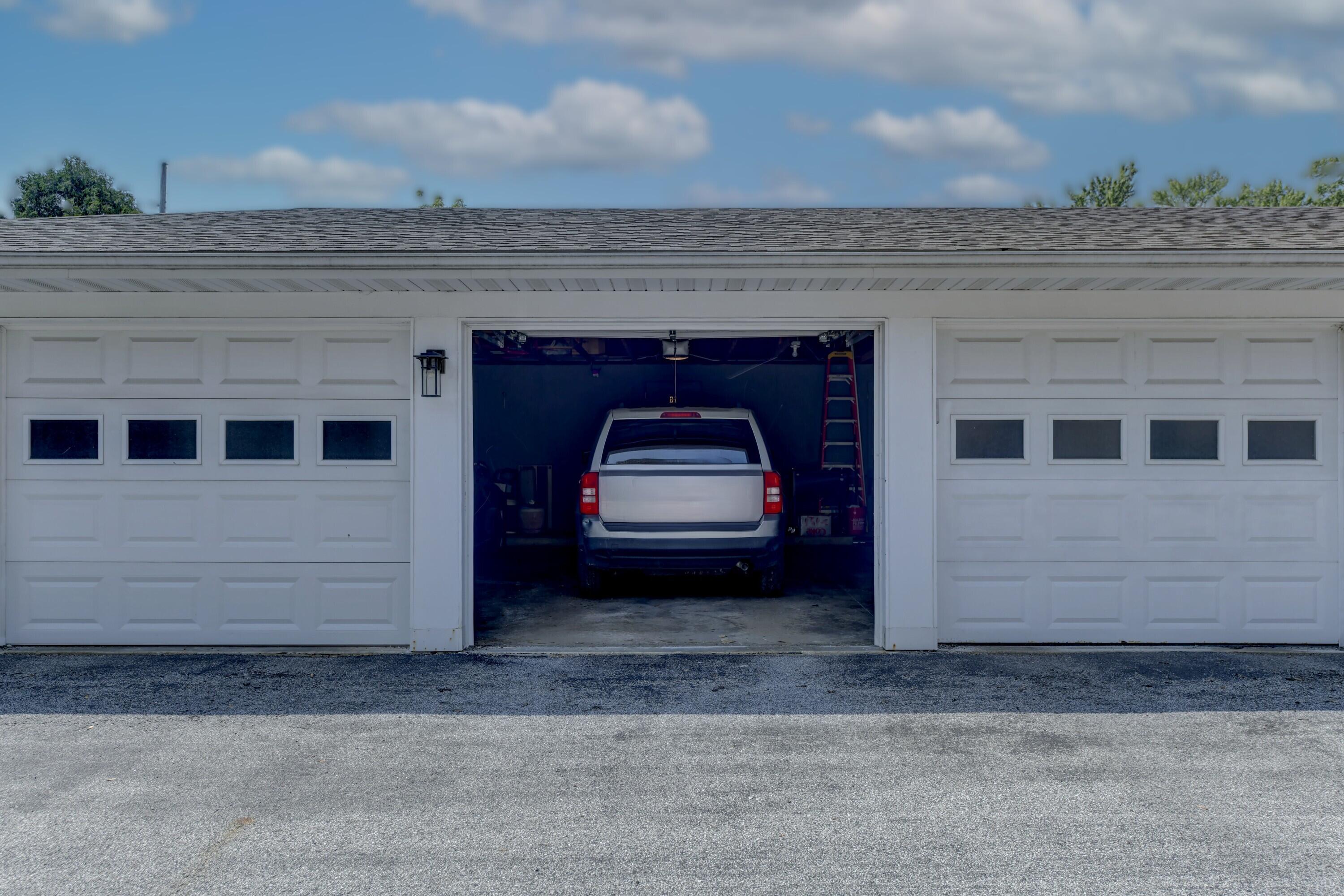 2740 Georgetowne Drive, Unit B1 Highland, IN 46322 - Photo 20 of 22 a car parked in front of a building
