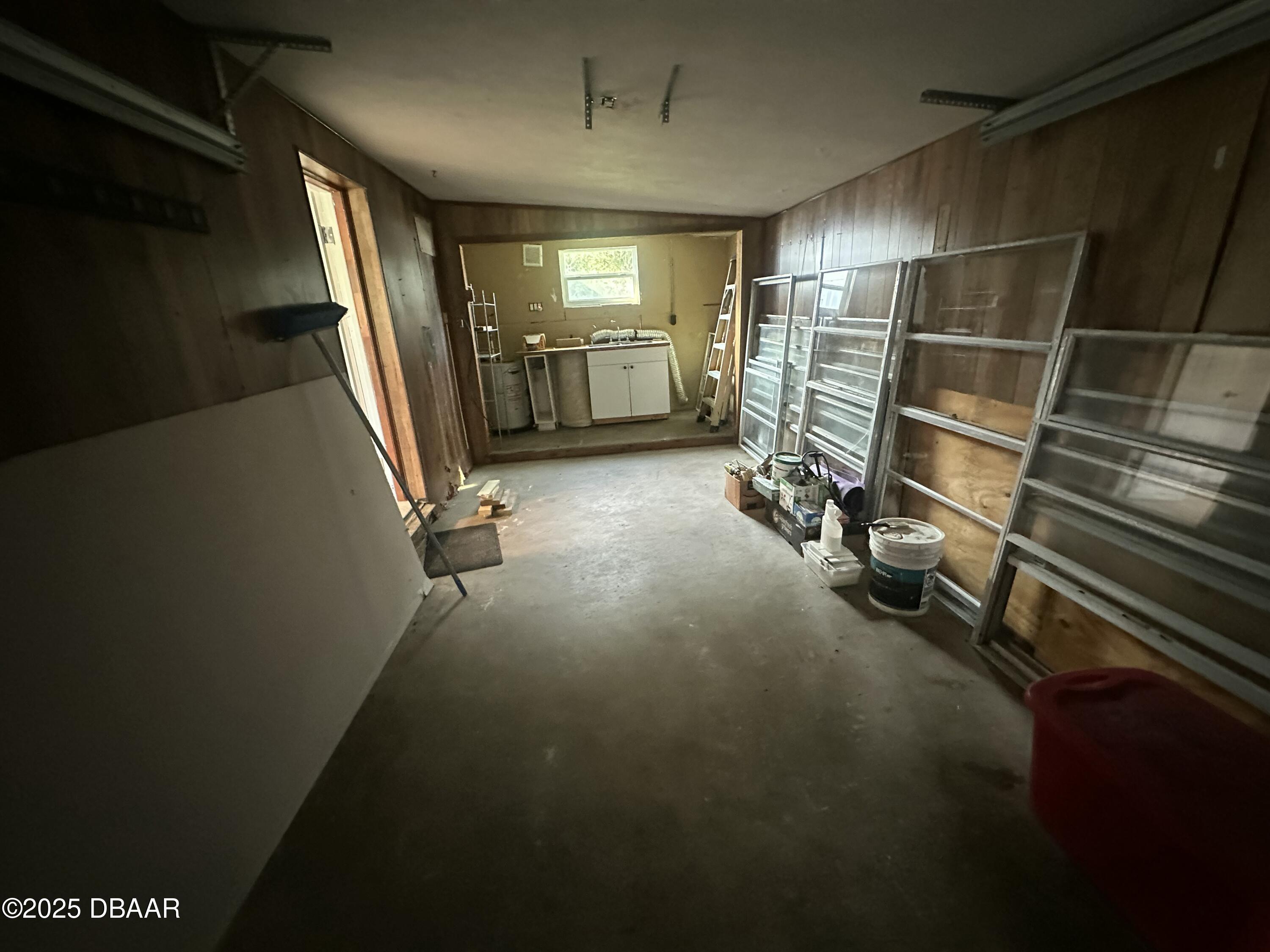 705 Largo Way South Daytona, FL 32119 - Photo 11 of 11 a view of a room with gym equipment