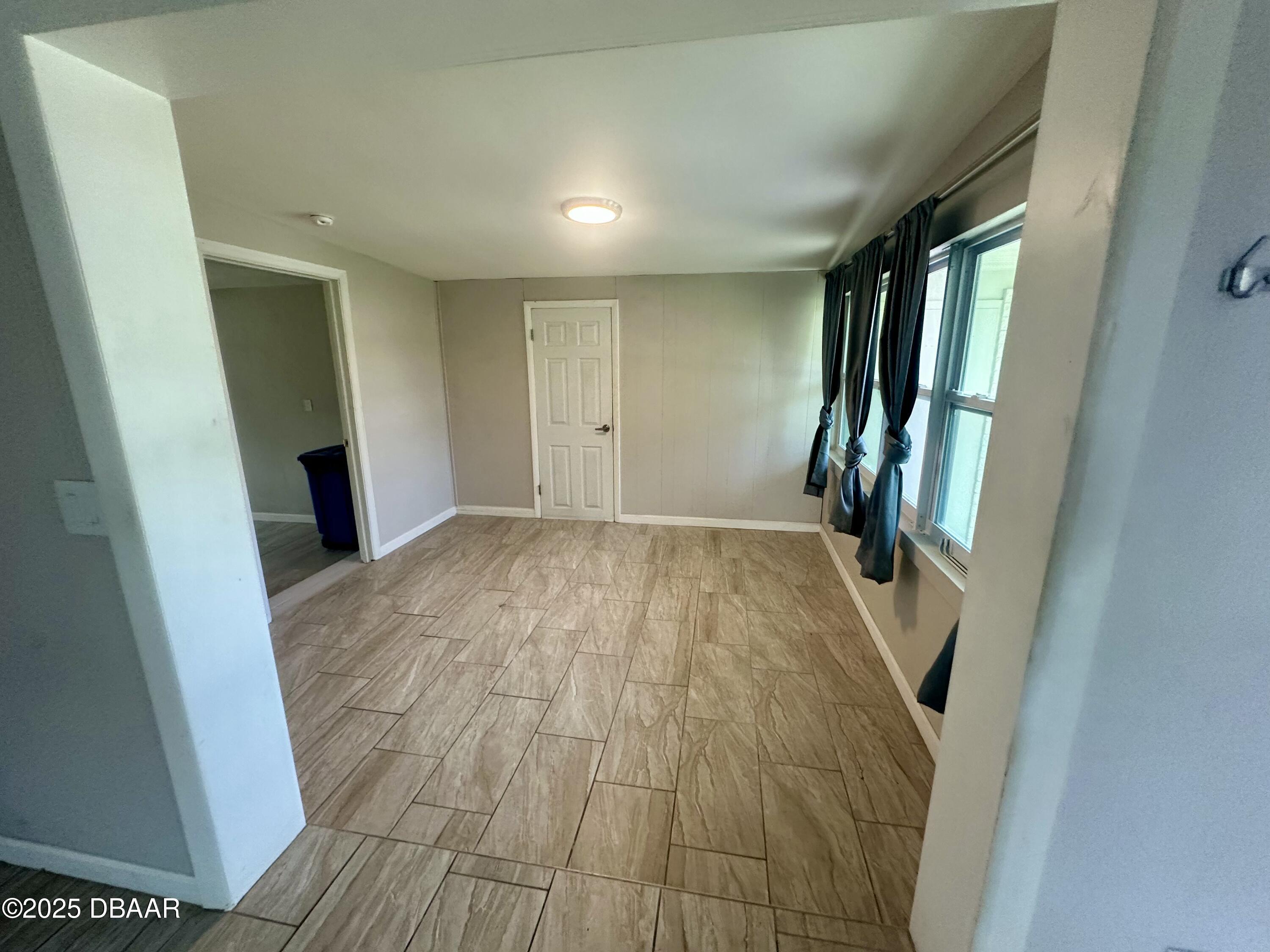 705 Largo Way South Daytona, FL 32119 - Photo 4 of 11 a view of a hallway and stairs