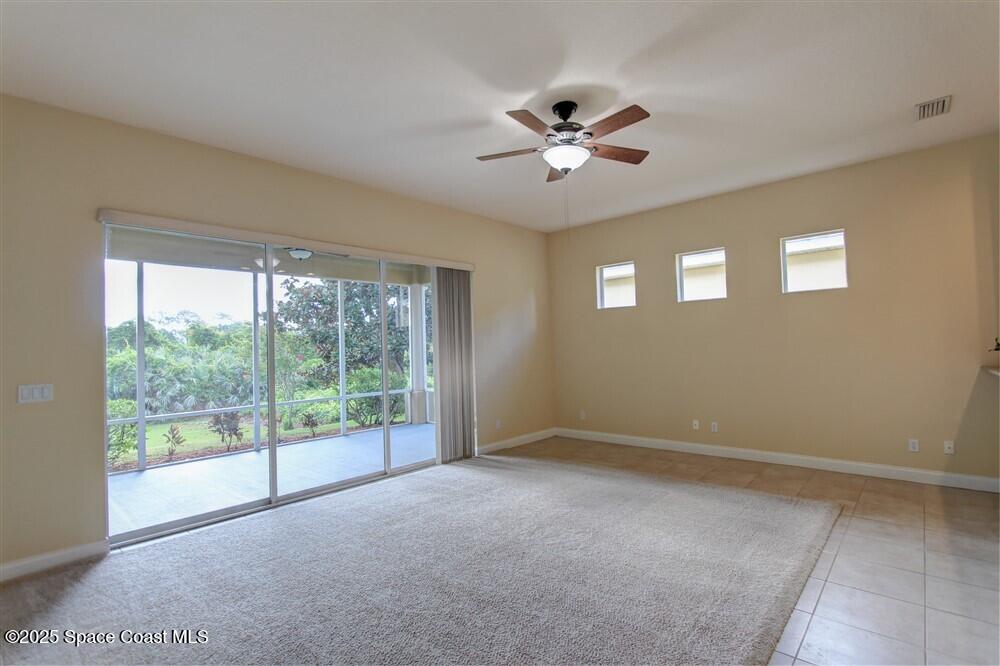 1175 Clubhouse Drive Rockledge, FL 32955 - Photo 28 of 40 a view of an empty room with a window