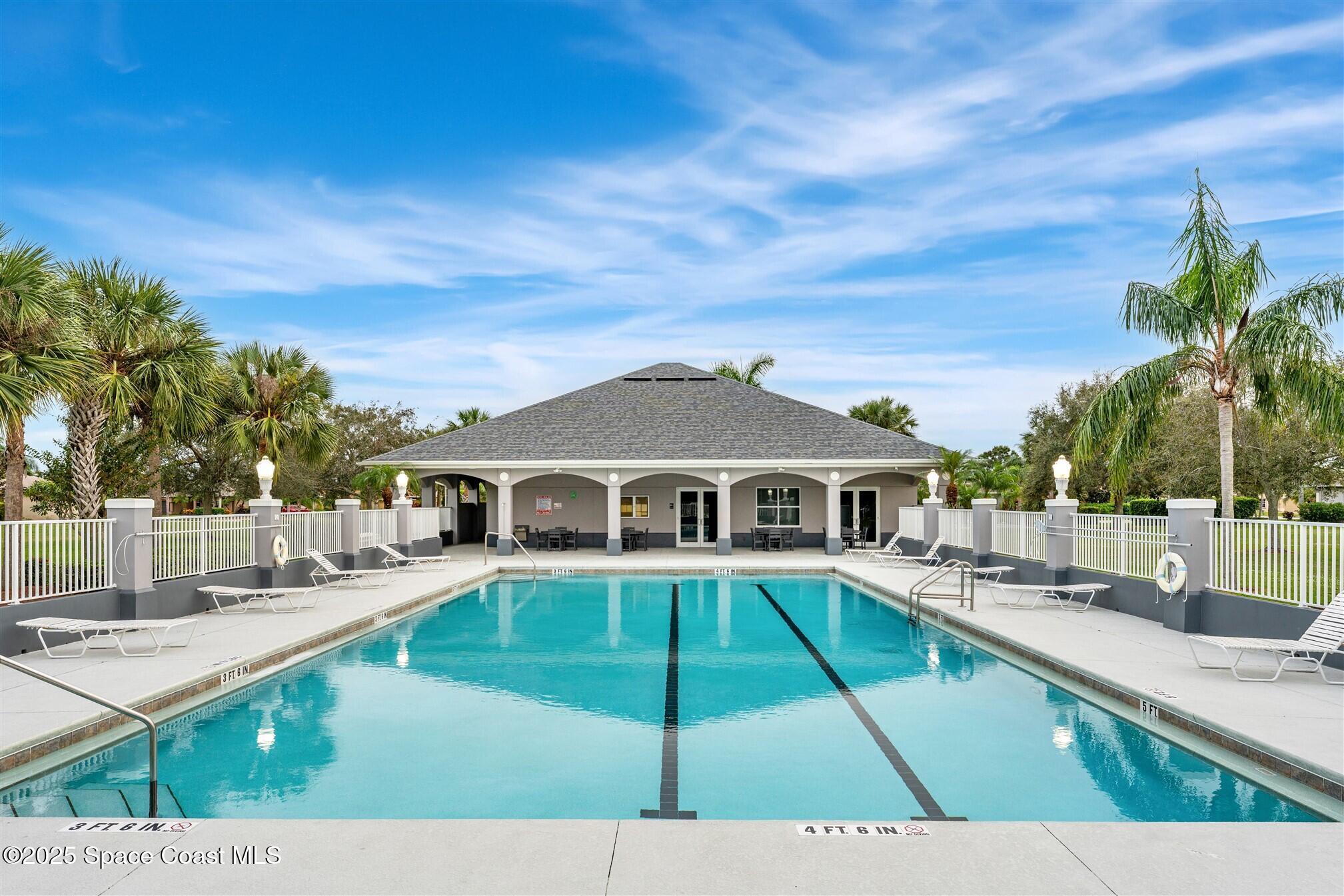 1175 Clubhouse Drive Rockledge, FL 32955 - Photo 36 of 40 a view of a house with a yard