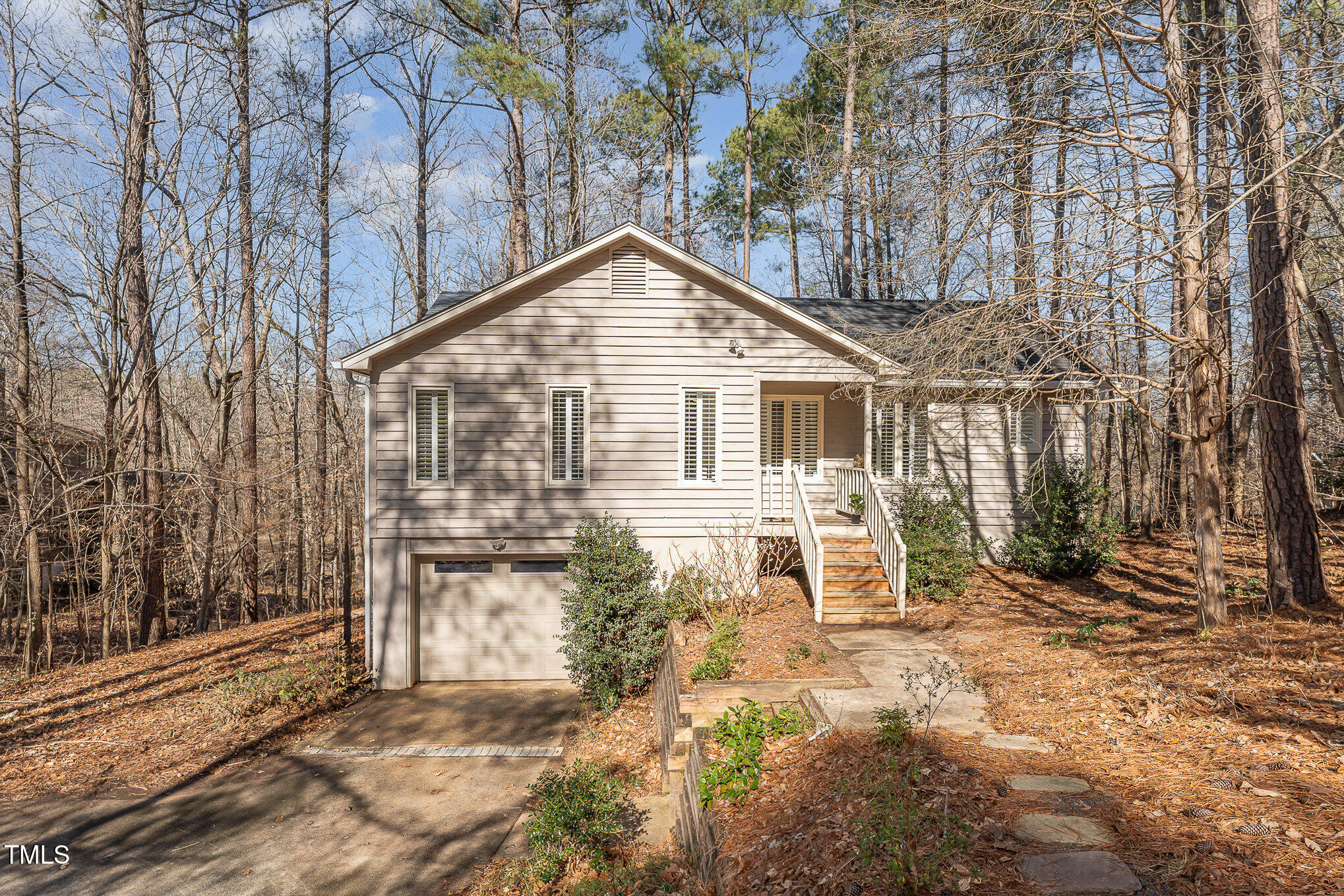 25 Sandstone Ridge Drive Durham, NC 27713 - Photo 1 of 33 a view of a house with yard and sitting area