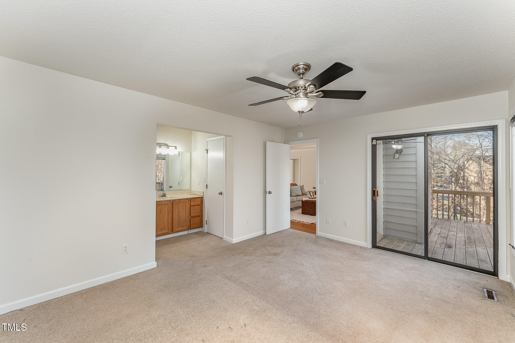 25 Sandstone Ridge Drive Durham, NC 27713 - Photo 12 of 33 an empty room with fan and windows